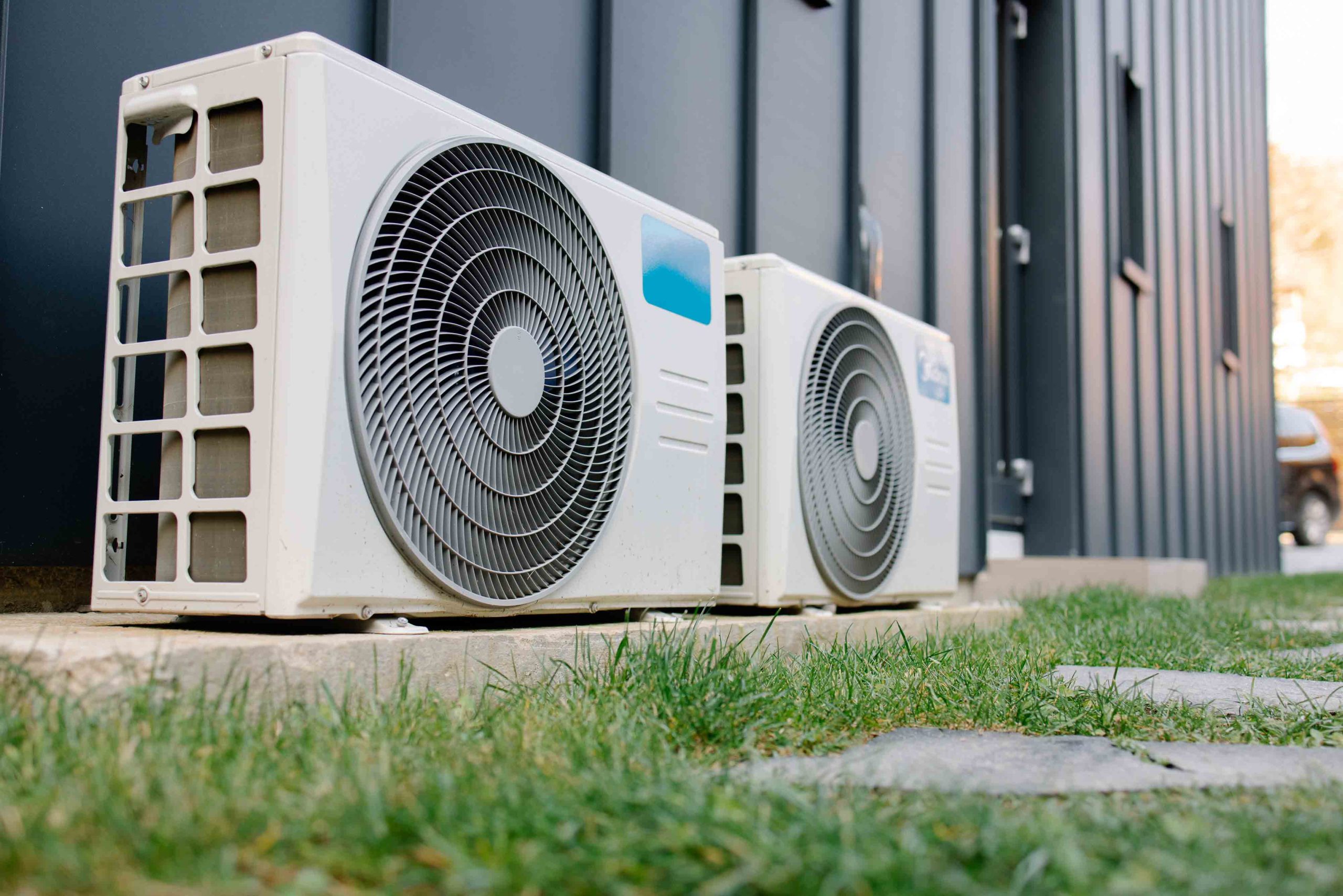 Outdoor air conditioning units providing climate control for a modern residential or commercial building